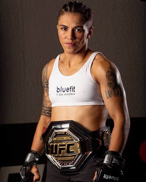 Bookmark. Jessica Andrade celebrated her UFC strawweight championship triumph over Rose Namajunas by posing for a picture - wearing nothing but her belt. The Brazilian became a champion after ...
